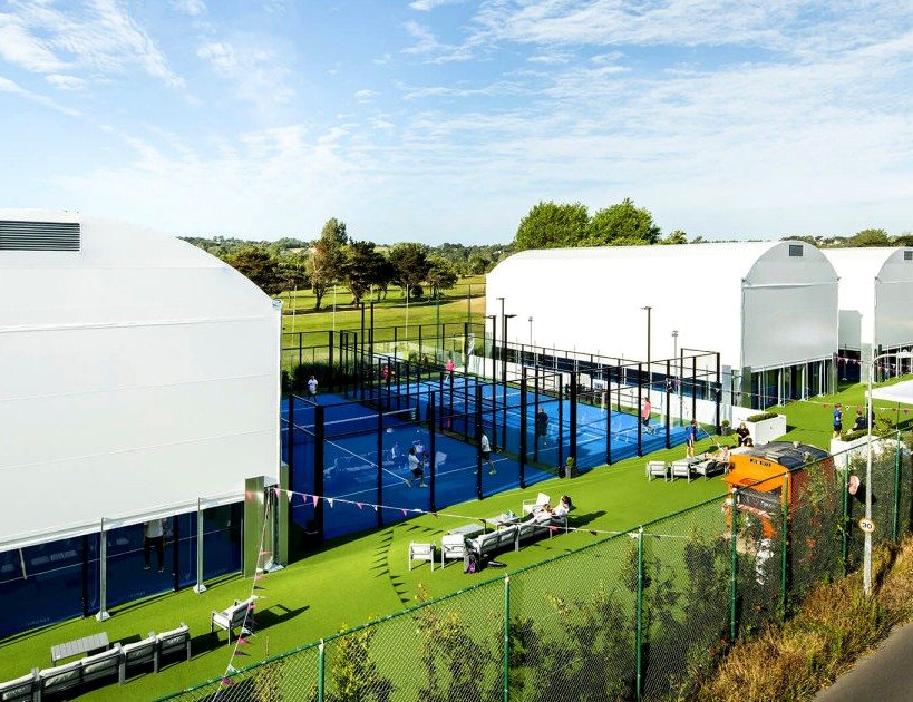 Covered padel courts and outdoor club area
